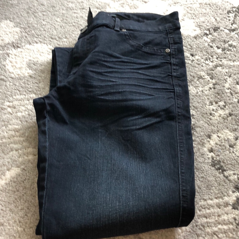 Dark blue denim jeggings.  Never worn
